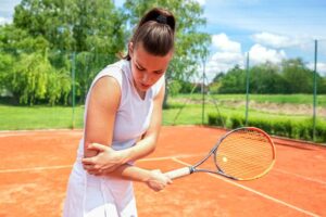 Curare il gomito del tennista con l'ozonoterapia a Lugano