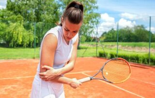 Curare il gomito del tennista con l'ozonoterapia a Lugano